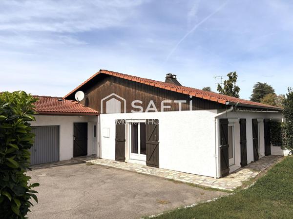 Maison de plain-pied avec 3 chambres et garage sur terrain de 520 m²