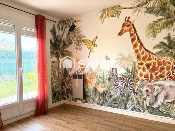 Maison de plain-pied avec 3 chambres et garage sur terrain de 520 m²