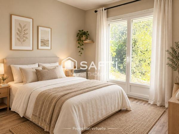 Maison de plain-pied avec 3 chambres et garage sur terrain de 520 m²