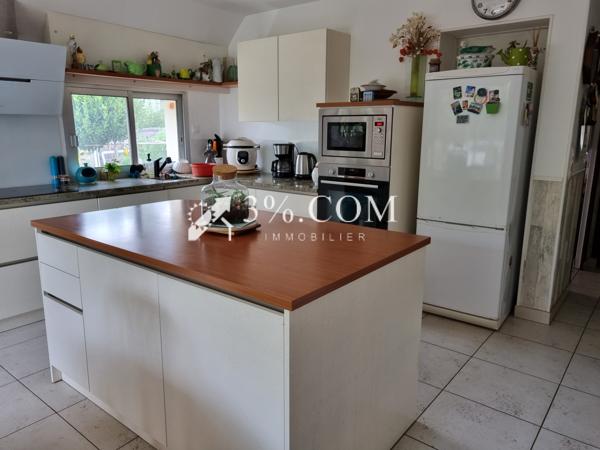 Maison 7 pièce(s) 4 chambre(s) 155 m²