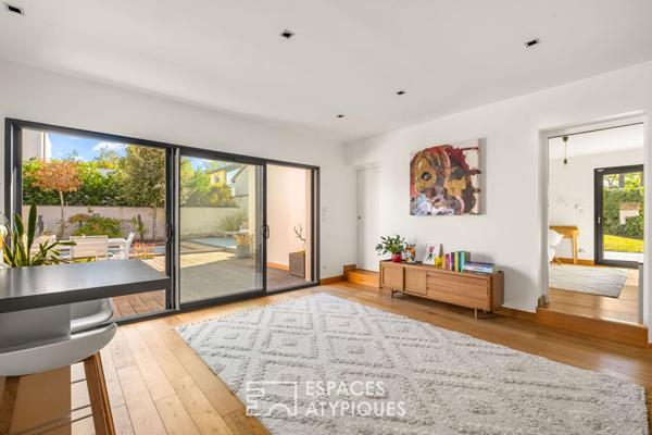 Maison contemporaine avec piscine et jardin paysagé au calme
