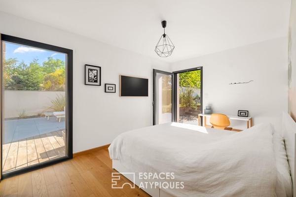 Maison contemporaine avec piscine et jardin paysagé au calme