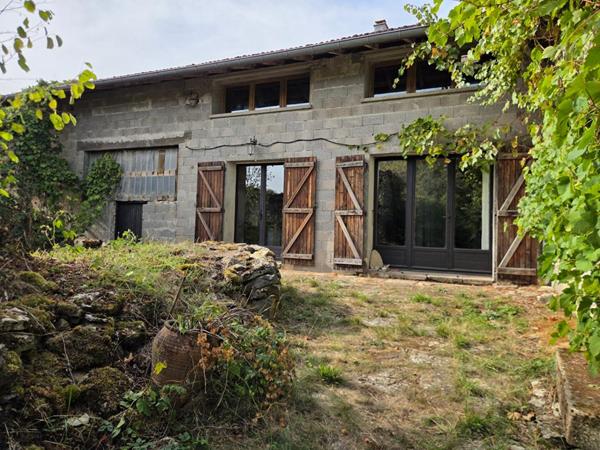 Ferme sur plus de 1600m² de terrain plat