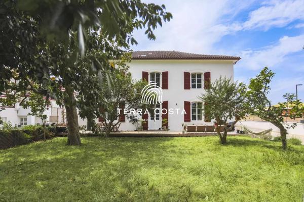 Duplex de 148 m² – Esprit maison – Jardin privatif de + 500 m²