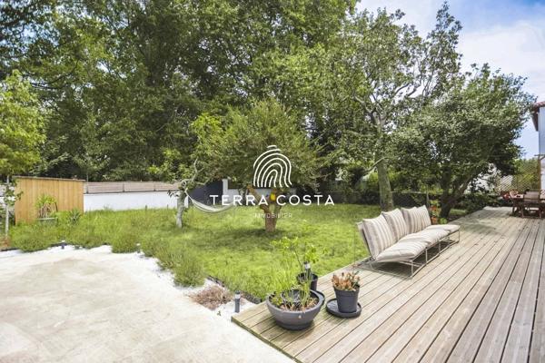 Duplex de 148 m² – Esprit maison – Jardin privatif de + 500 m²