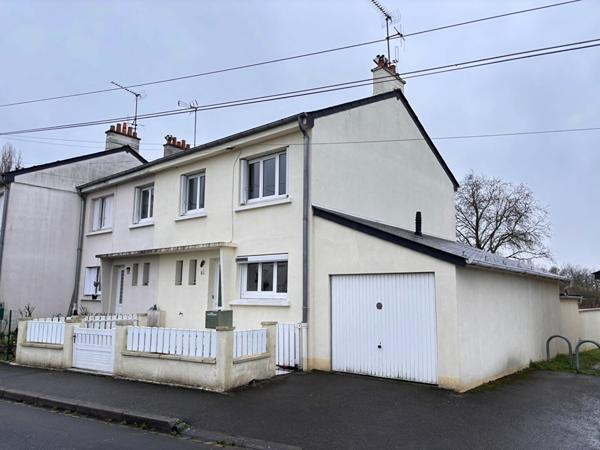 Maison familiale proche centre-ville de la Flèche, quartier calme