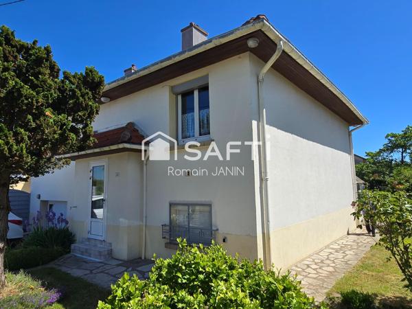 Maison individuelle sur sous-sol complet avec grand terrain et garages