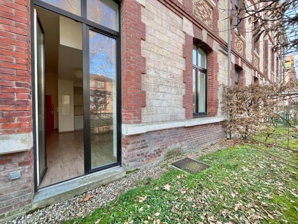 Appartement T2 avec jardin et place de stationnement sécurisée