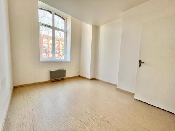Appartement T2 avec jardin et place de stationnement sécurisée