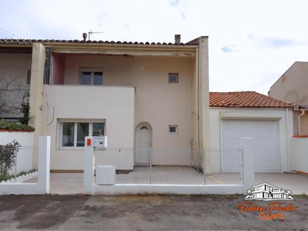 Maison de ville rénovée avec garage et jardin