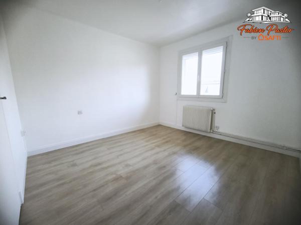 Maison de ville rénovée avec garage et jardin