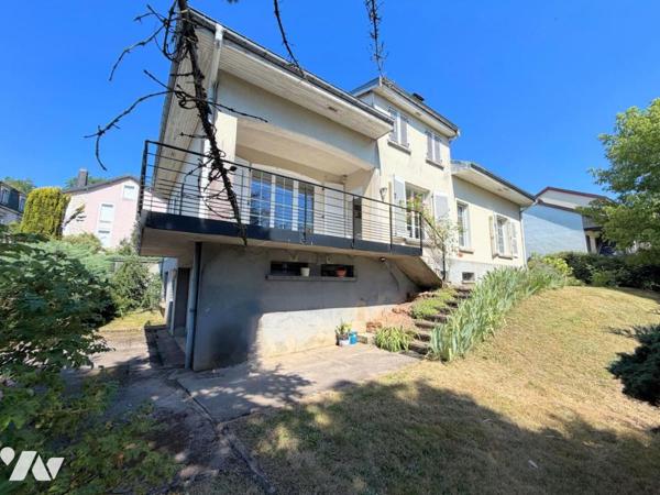 Maison individuelle et terrain attenant