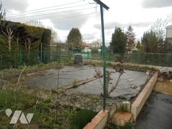 Maison située secteur gare avec jardin et garage