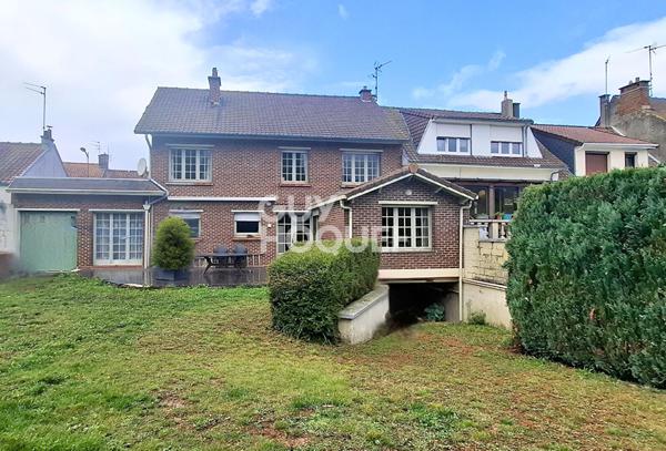 Opportunité à Arques : maison familiale avec jardin et garage