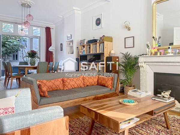 Très belle maison avec grand garage, espace extérieur situé en centre ville