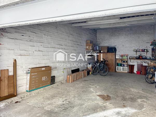 Très belle maison avec grand garage, espace extérieur situé en centre ville
