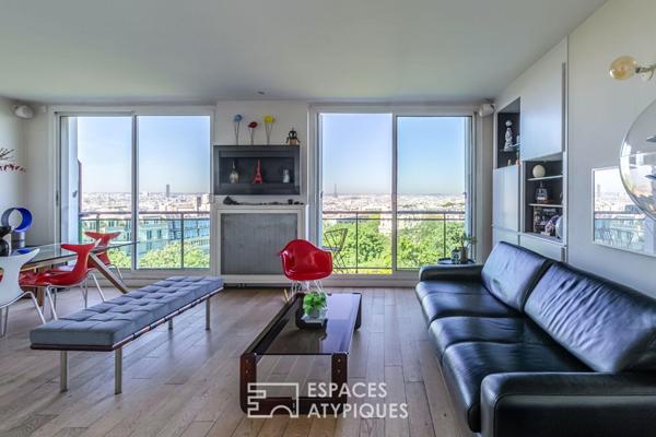 Appartement suspendu sur le parc des Buttes-Chaumont et la skyline parisienne