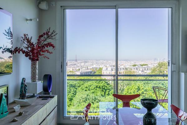 Appartement suspendu sur le parc des Buttes-Chaumont et la skyline parisienne
