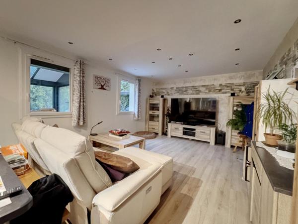 Maison 4 chambres - garage- atelier - jardin - beaux volumes de pièces de vie