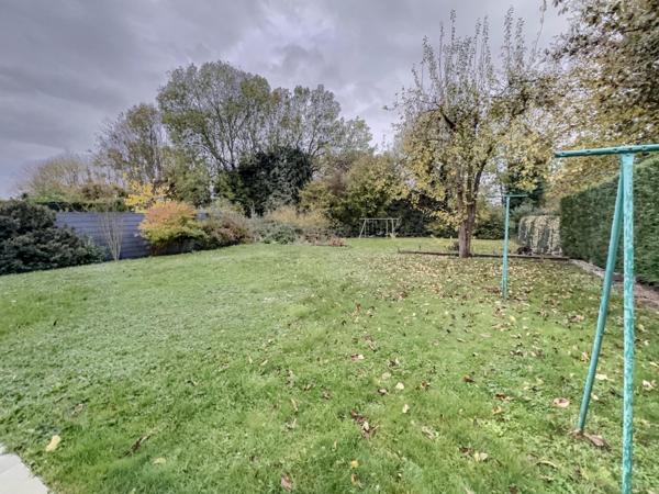 Maison 4 chambres - garage- atelier - jardin - beaux volumes de pièces de vie