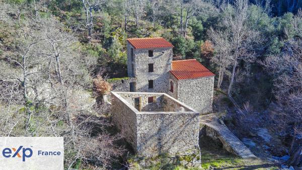 MOULIN A FINIR DE RÉNOVER SUR 1,390 HA