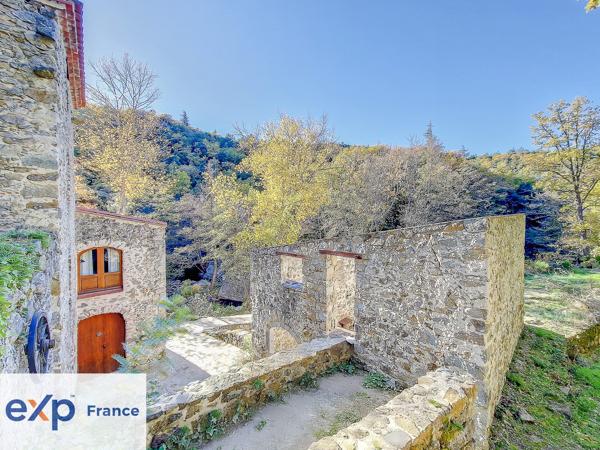 MOULIN A FINIR DE RÉNOVER SUR 1,390 HA