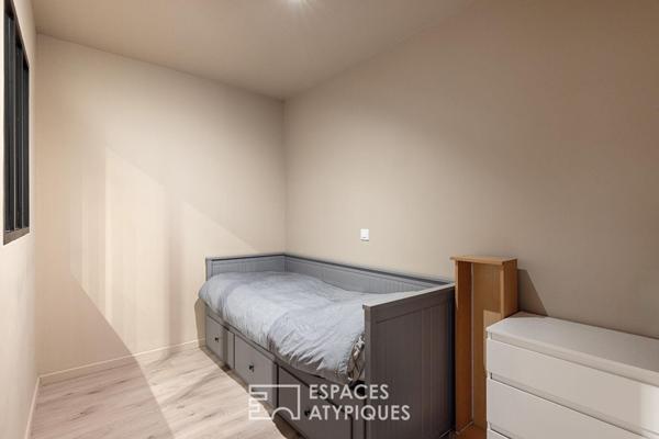 Loft inversé industriel avec terrasse et double parking