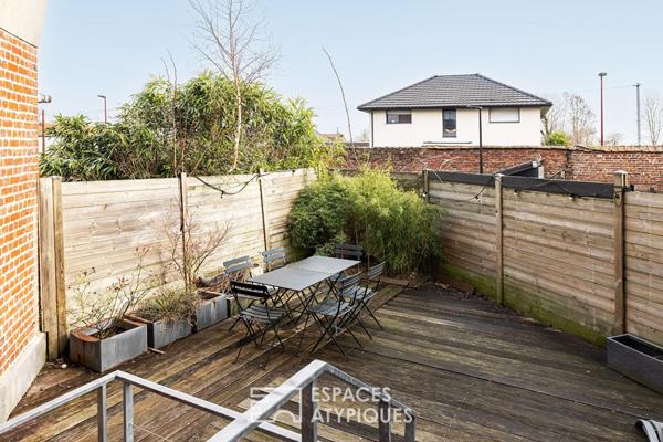Loft inversé industriel avec terrasse et double parking