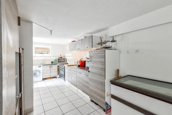 MAISON CONTEMPORAINE  4 CHAMBRES HABITABLE DE PLAIN PIED PROCHE CENTRE