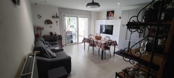 Le charme d'une ancienne maison de ville restaurée aux normes du confort actuel proche de tous services