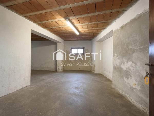 Maison de ville avec studio indépendant, grand garage de 70 m² et jardin clos en plein centre de Moissac !