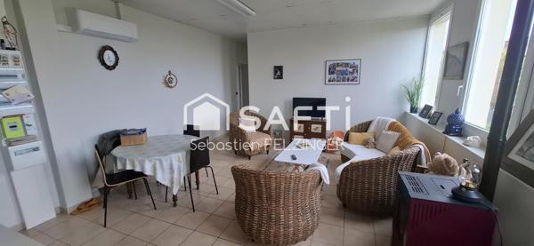 Immeuble de rapport locatif avec parking, terrasse et jardin