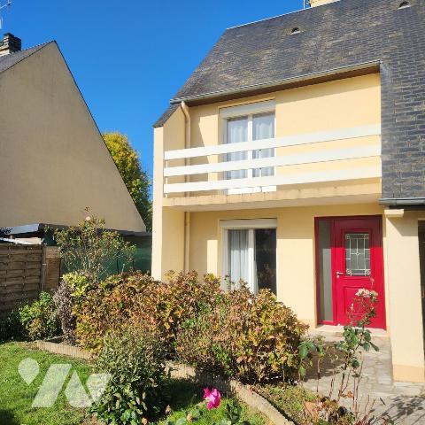 Charmante maison mitoyenne avec jardin et garage 