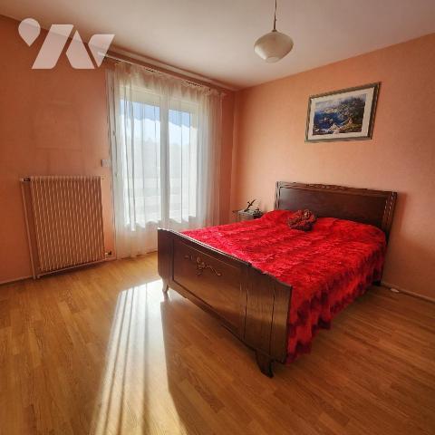 Charmante maison mitoyenne avec jardin et garage 