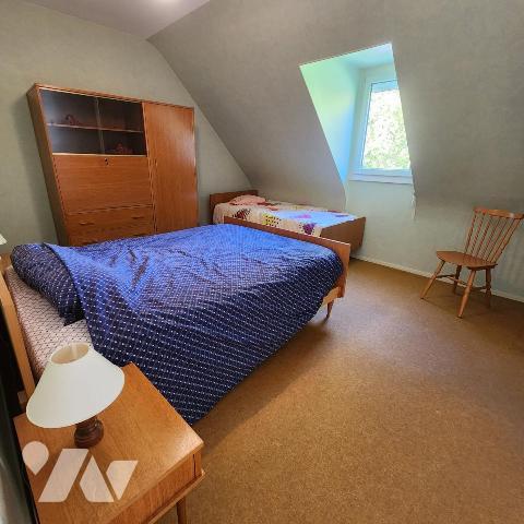 Charmante maison mitoyenne avec jardin et garage 