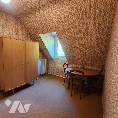 Charmante maison mitoyenne avec jardin et garage 