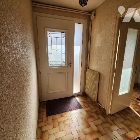 Charmante maison mitoyenne avec jardin et garage 