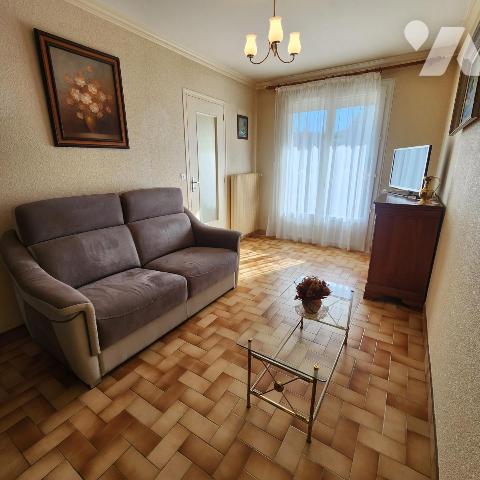 Charmante maison mitoyenne avec jardin et garage 