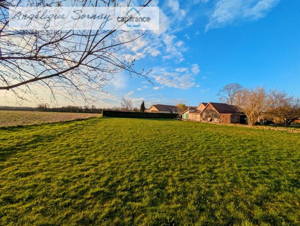 Terrain plat de 1 253 m² – Vue dégagée plein sud au cœur d’un village calme - à 5 min de bletterans