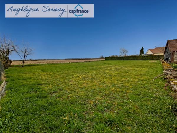 Terrain plat de 1 253 m² – Vue dégagée plein sud au cœur d’un village calme - à 5 min de bletterans