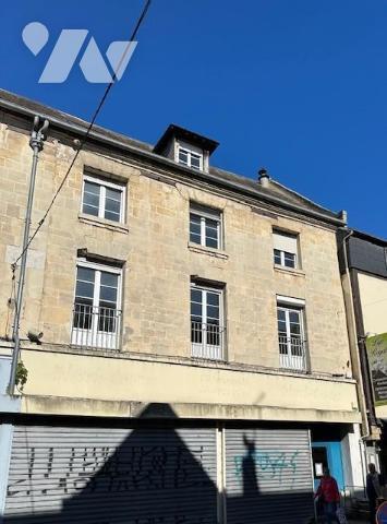 EU : immeuble de rapport avec 2 commerces et 2 appartements