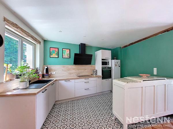 A Vendre Maison de ville en pierre avec deux chambres, terrasse et jardin au centre d'Eauze