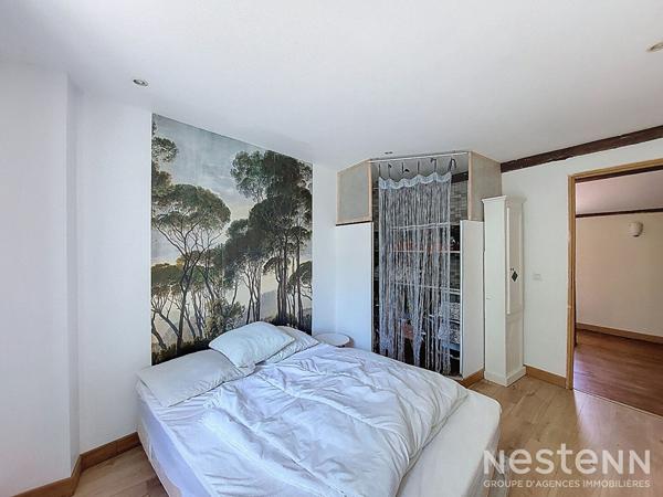 A Vendre Maison de ville en pierre avec deux chambres, terrasse et jardin au centre d'Eauze