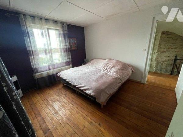 A VENDRE:  maison de ville de 129 m² habitables, située à Divion (62), sur une belle parcelle d...