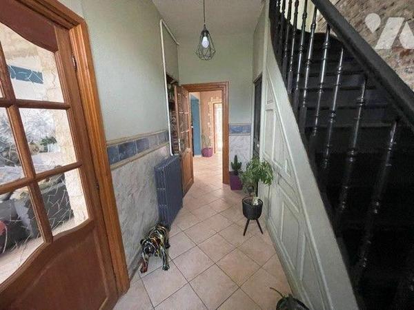 A VENDRE:  maison de ville de 129 m² habitables, située à Divion (62), sur une belle parcelle d...