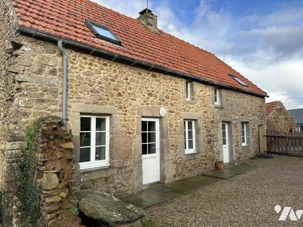 Maison rénovée avec garage et dépendances