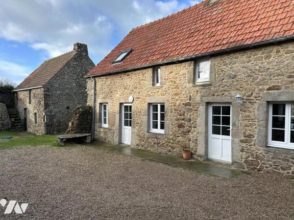 Maison rénovée avec garage et dépendances