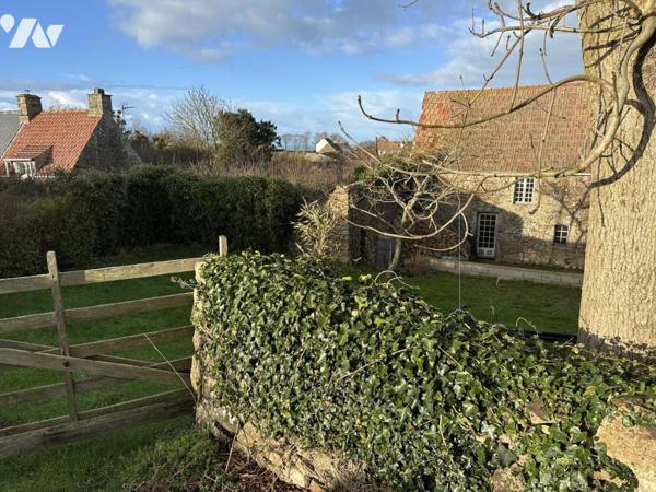 Maison rénovée avec garage et dépendances