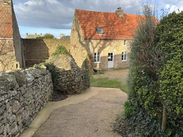 Maison rénovée avec garage et dépendances