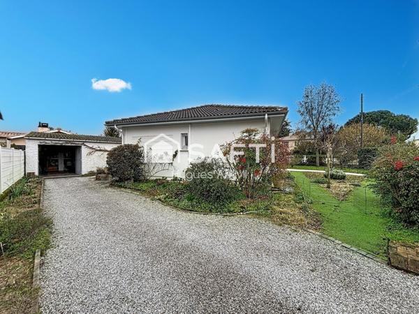 Maison non mitoyenne 3 chambres avec garage et jardin